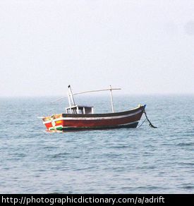 A boat adrift at sea.