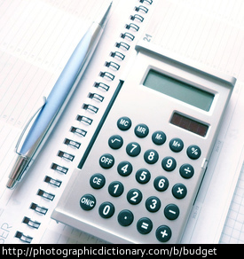 Photo of a calculator and pen