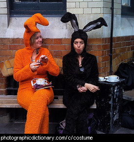 Photo of two people wearing easter bunny costumes