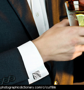 Photo of some silver cufflinks.