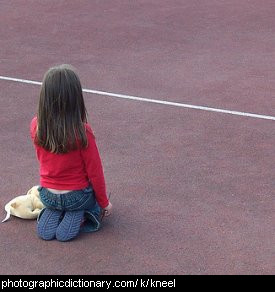 Photo of a girl kneeling