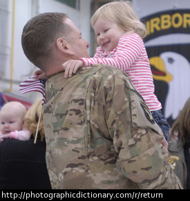 A man returning from duty in the army