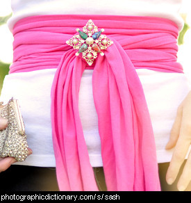 Photo of a woman wearing a sash