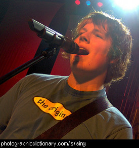 Photo of a young man singing