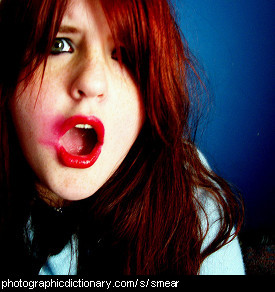 Photo of a woman with smeared lipstick