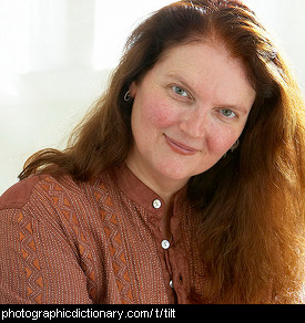 Photo of a woman tilting her head