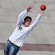 Photo of a boy catching a ball.